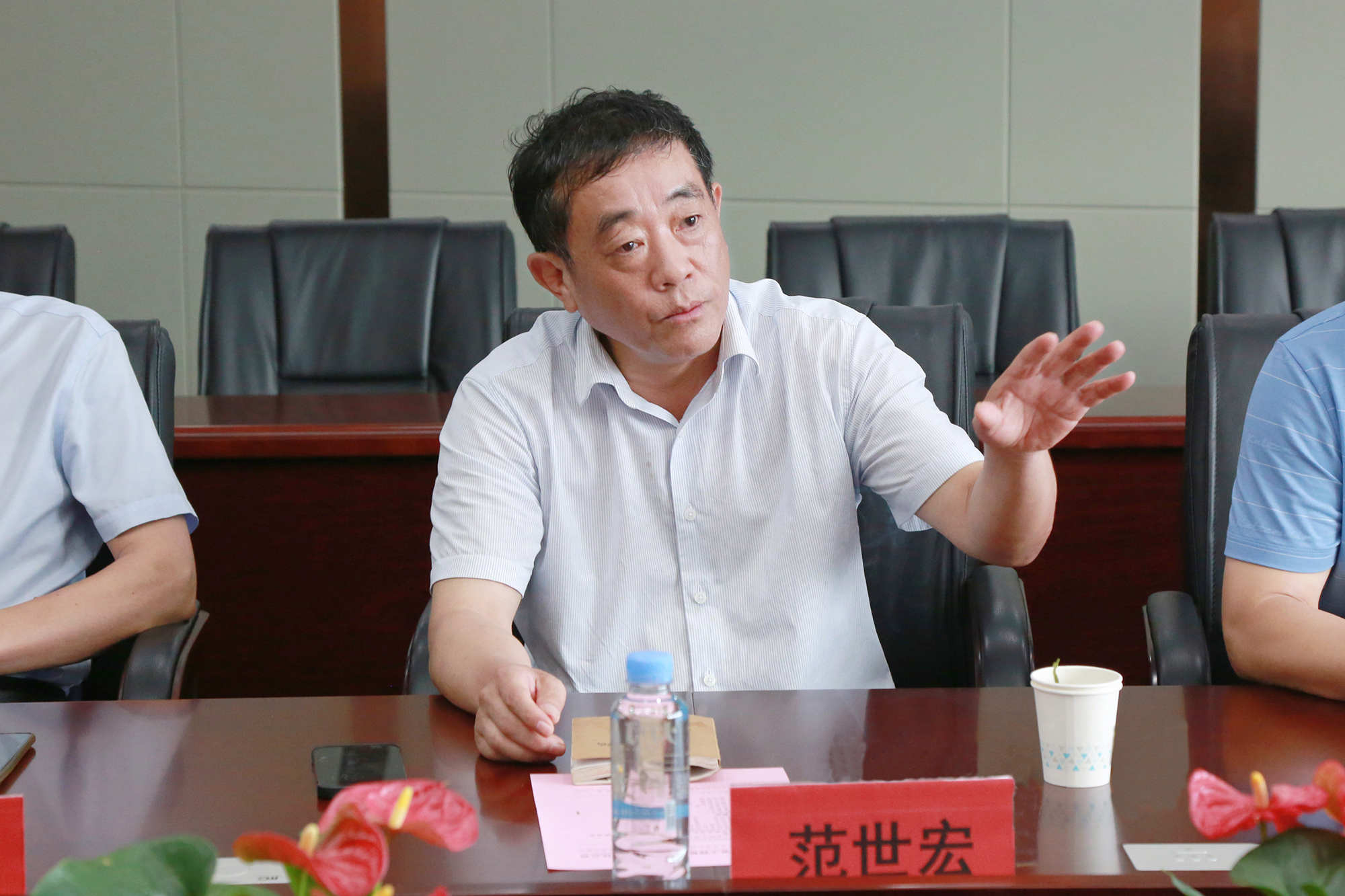 1692064853134613.jpg 范会长.JPG